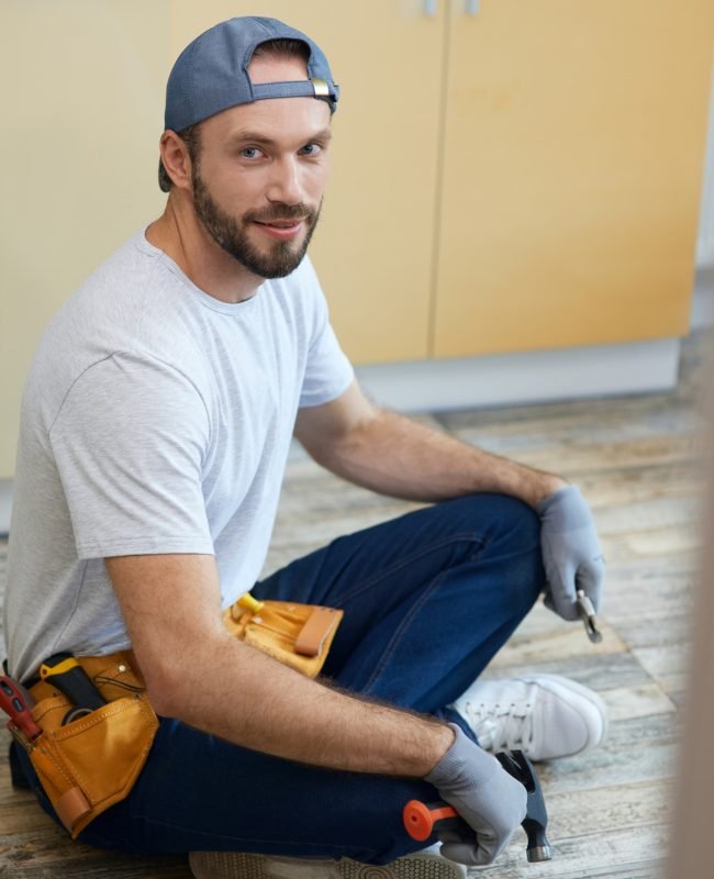 full-length-shot-of-young-repairman-looking-at-camera-holding-plumbing-tools-in-his-hands.jpg full-length-shot-of-young-repairman-looking-at-camera-holding-plumbing-tools-in-his-hands.jpg